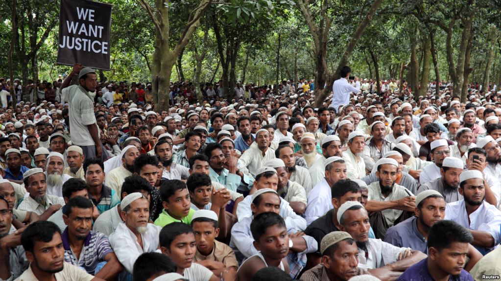 Rohingya refugees take part in a protest at the Kutupalong refugee camp to mark the one-year anniversary of their exodus from Myanmar, in Cox's Bazar, Bangladesh, Aug. 25, 2018.