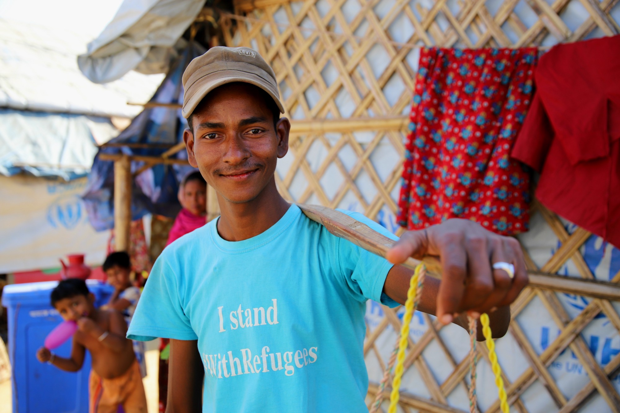 Saidul and his brother have become very popular in the camps, bringing toys and beauty products to people’s homes. Photo: WFP/Gemma Snowdon