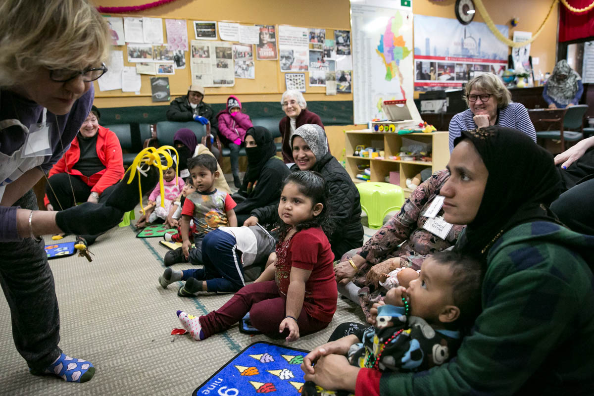 Rohingya mothers play with their children during a 'Mommy and Me' class at the Rohingya Cultural Center of Chicago. The class teaches children structured play, mothers how to bond with their children and prepare the children for school. Photo: ALLISON JOYCE/GETTY IMAGES