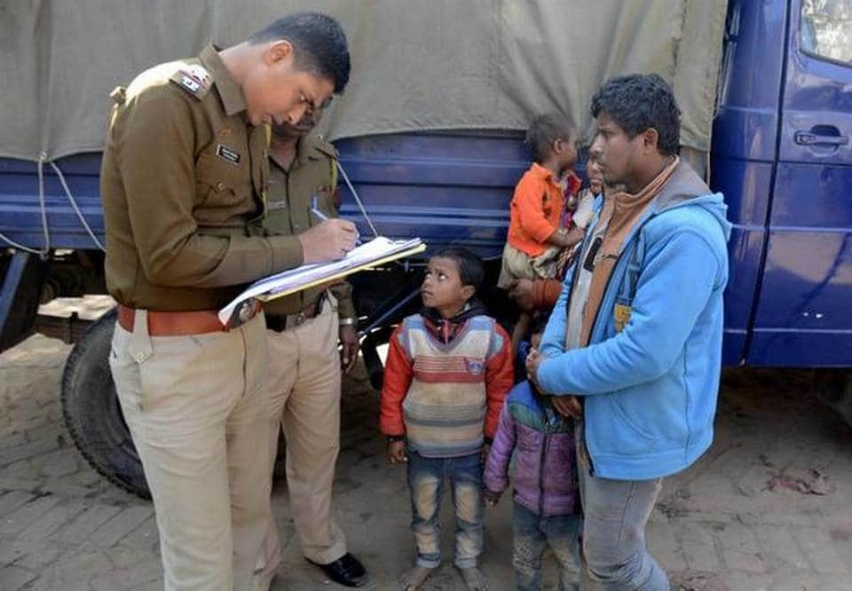 A policeman registers the names of Rohingya refugees after they were detained while crossing the India-Bangladesh border from Bangladesh, at Rayermura village on the outskirts of Tripura capital Agartala on January 22, 2019. (Photo: AFP)