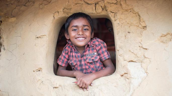 A Rohingya refugee in one of the mud-hut schools, disguised to look like dwellings to stop them being attacked by locals TIMES PHOTOGRAPHER JACK HILL