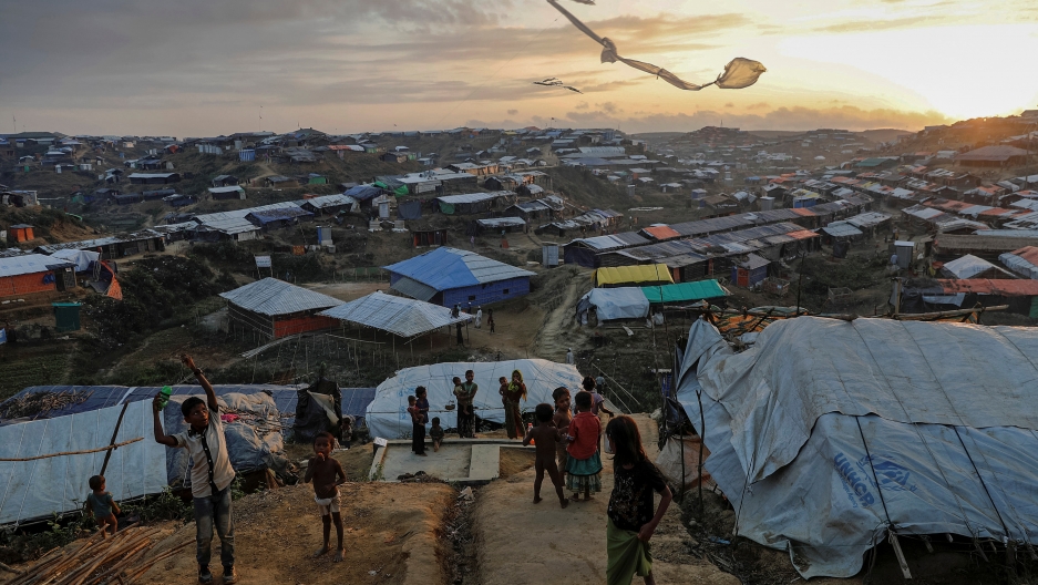 Rohingya refugee children fly improvised kites at the Kutupalong refugee camp near Cox's Bazar, Bangladesh. Credit: Damir Sagolj/Reuters