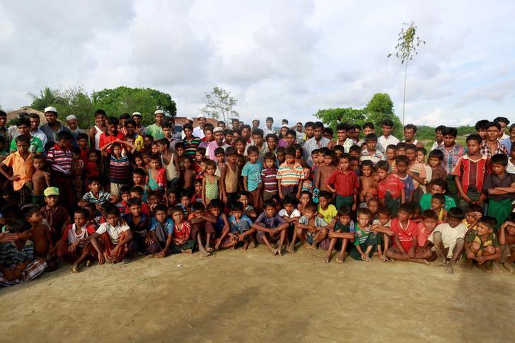 Rohingya Muslims attend a wrestling festival at Kyaukpannu village in Maungdaw, northern Rakhine state, June 6, 2014. REUTERS/Soe Zeya Tun