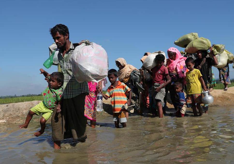 Rohingya fleeing to Bangladesh (Photo: Reuters)