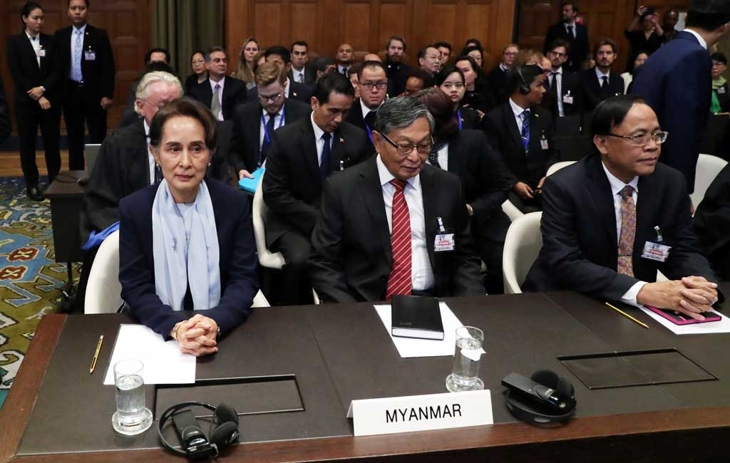 Myanmar's leader Aung San Suu Kyi attends a hearing on the second day of hearings in a case filed by Gambia against Myanmar alleging genocide against the minority Muslim Rohingya population, at the International Court of Justice (ICJ) in The Hague, Netherlands December 11, 2019 Reuters