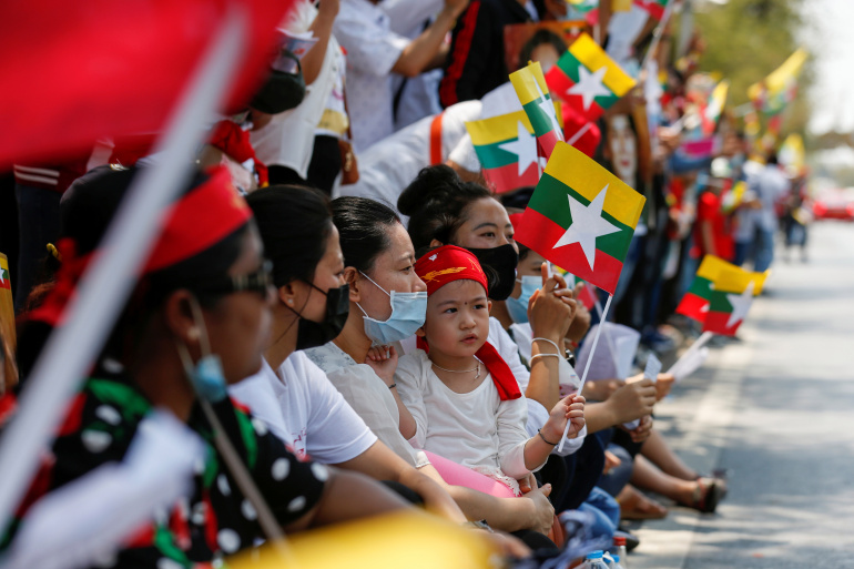 Myanmar citizens living in Thailand protest against the military coup in their country in front of the UN office in Bangkok, Thailand on March 7, 2021 [Reuters/Soe Zeya Tun]